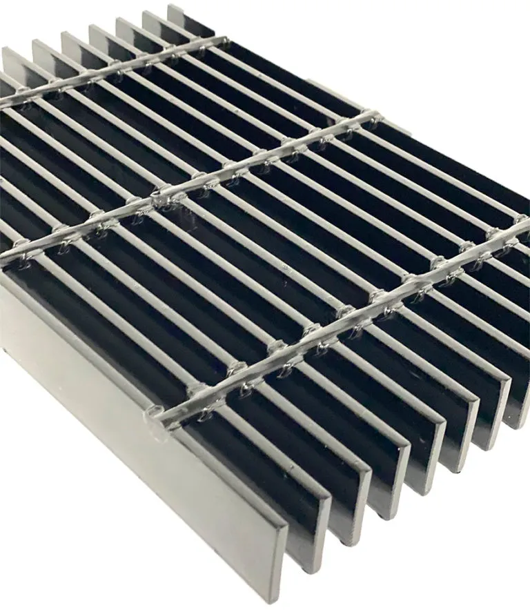 Bundle of galvanized welded grating panels bound with steel strapping; low three-quarter view