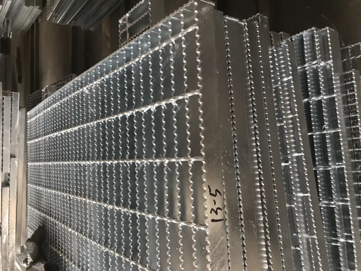 Mezzanine grating floor with safety gate and railings in warehouse