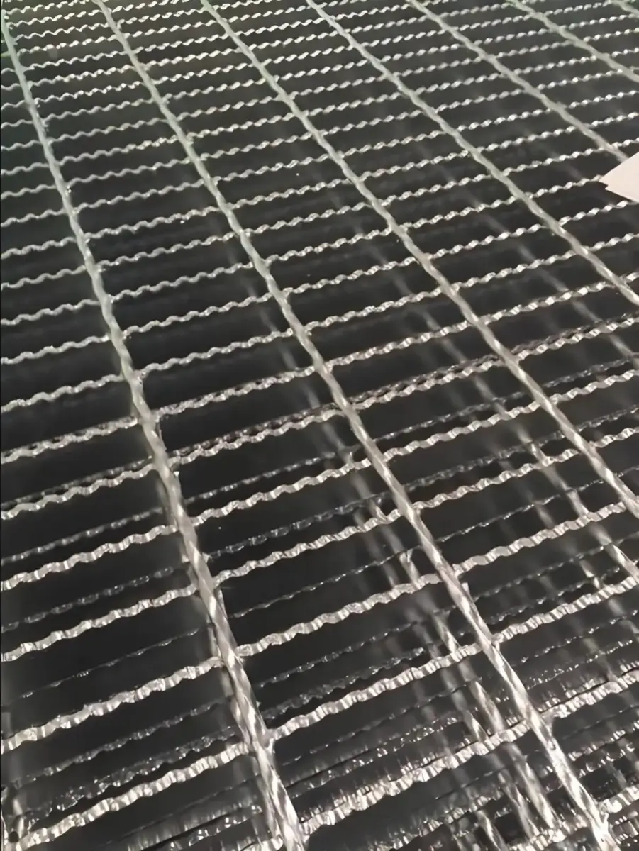 Rectangular galvanized welded grating panel; three-quarter view on white background