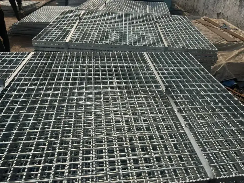 Rectangular galvanized welded grating panel; three-quarter view on white background