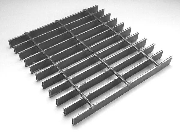 Macro close-up of weld points between bearing bars and cross bars on welded grating