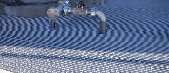 Close-up of grating panel end showing welded end band/bar detail