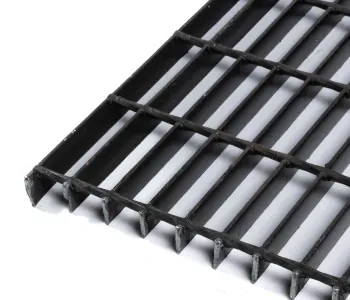 Warehouse rows of welded grating panels tied with red strapping; aisles between stacks