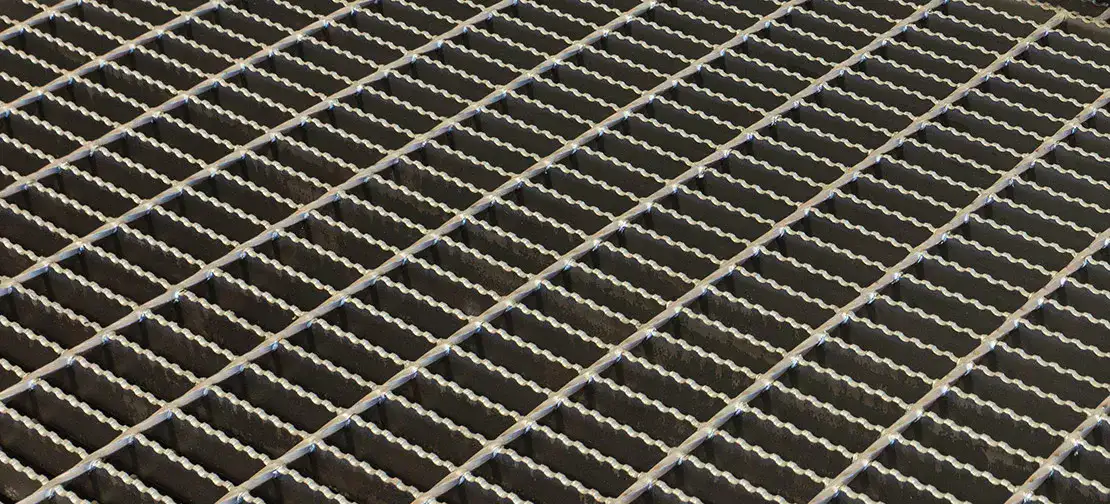 Rectangular galvanized welded grating panel; three-quarter view on white background