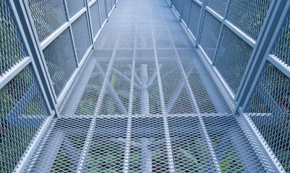 Rectangular galvanized welded grating panel; three-quarter view on white background