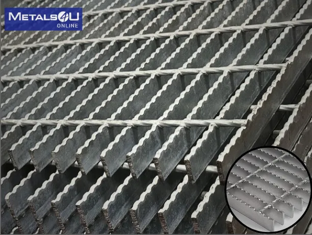 Welded steel bar grating close-up; galvanized; white studio background