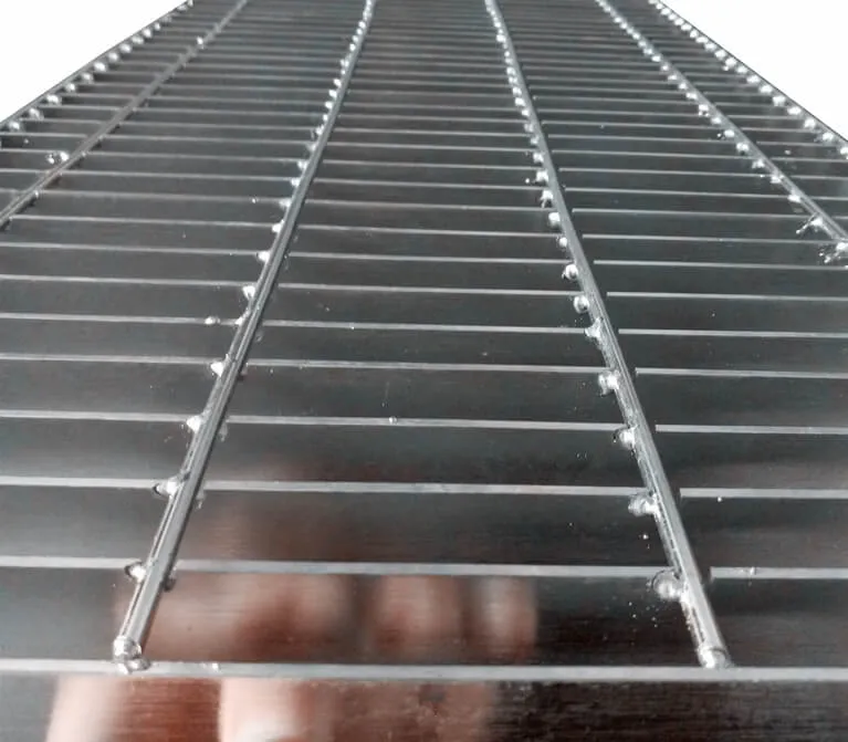 Rectangular galvanized welded grating panel; three-quarter view on white background