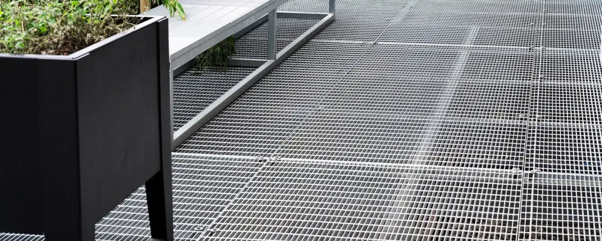 Rectangular galvanized welded grating panel; three-quarter view on white background