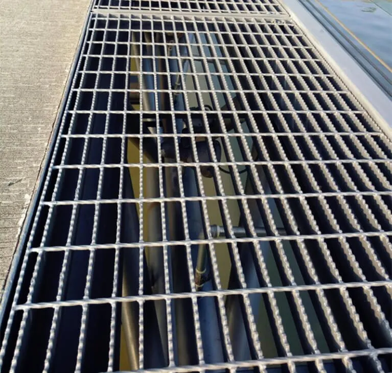 Welded steel bar grating close-up; galvanized; white studio background