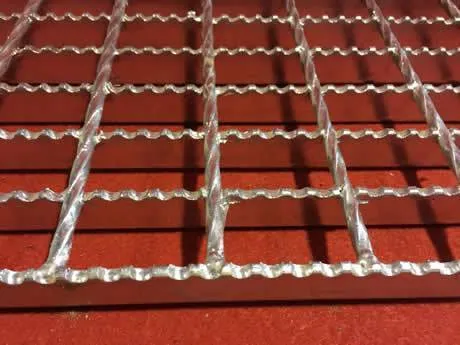 Rectangular galvanized welded grating panel; three-quarter view on white background