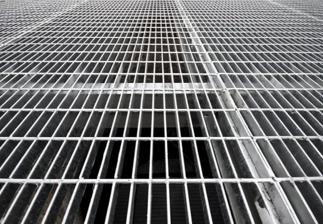 Rectangular galvanized welded grating panel; three-quarter view on white background