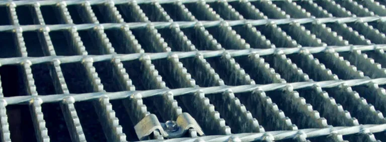 Rectangular galvanized welded grating panel; three-quarter view on white background