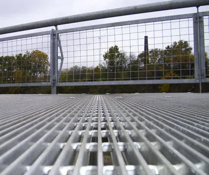 Rectangular galvanized welded grating panel; three-quarter view on white background