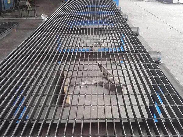 Rectangular galvanized welded grating panel; three-quarter view on white background